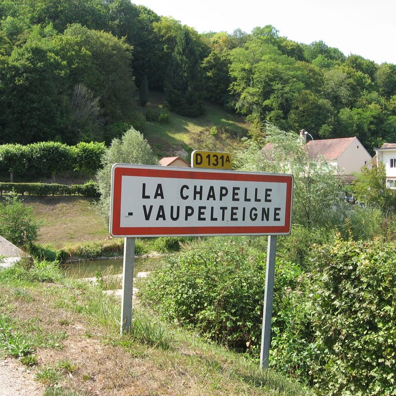 Road sign for the village of La Chapelle-Vaupelteigne
